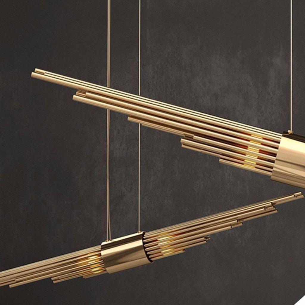 rich materials and sleek, sophisticated lines and elegant long gold plated brass tubes